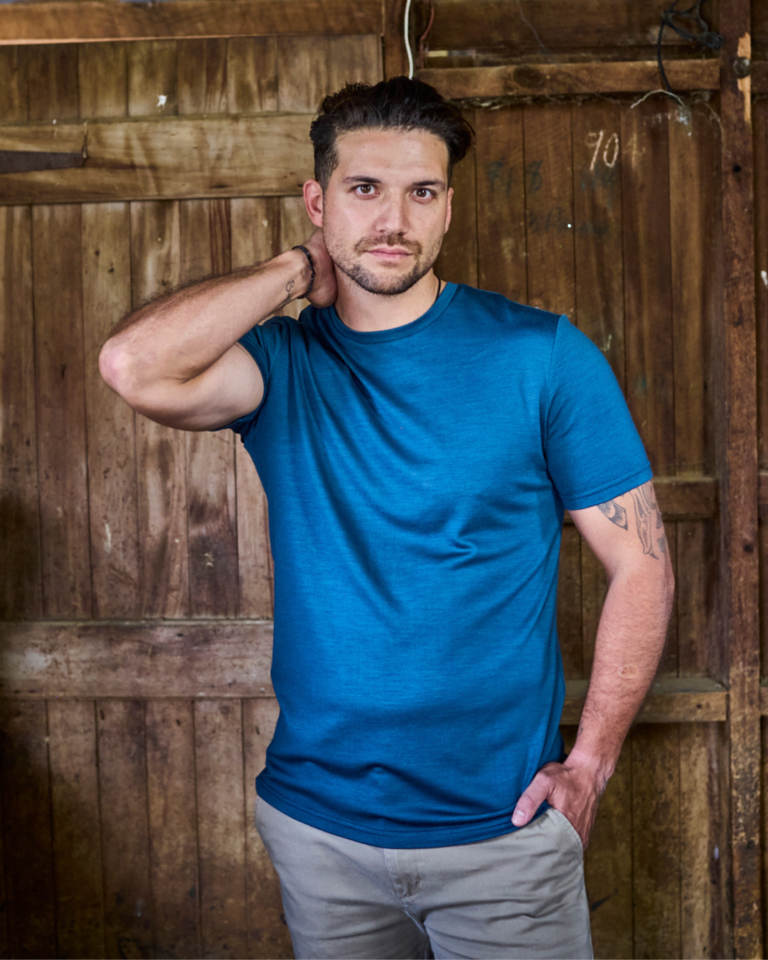 Orion blue merino crew-neck tee β Merino 365 short sleeve, fine knit, worn in a relaxed lifestyle setting