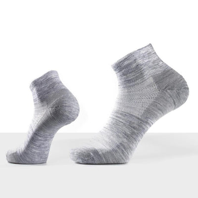 Folded merino polo and ankle socks bundle styled together, neutral tones, Merino 365