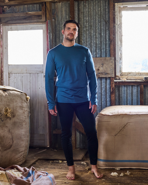 Black merino wool base layer pants by Merino 365 — slim cut, clean finish, lightweight knit fabric.
