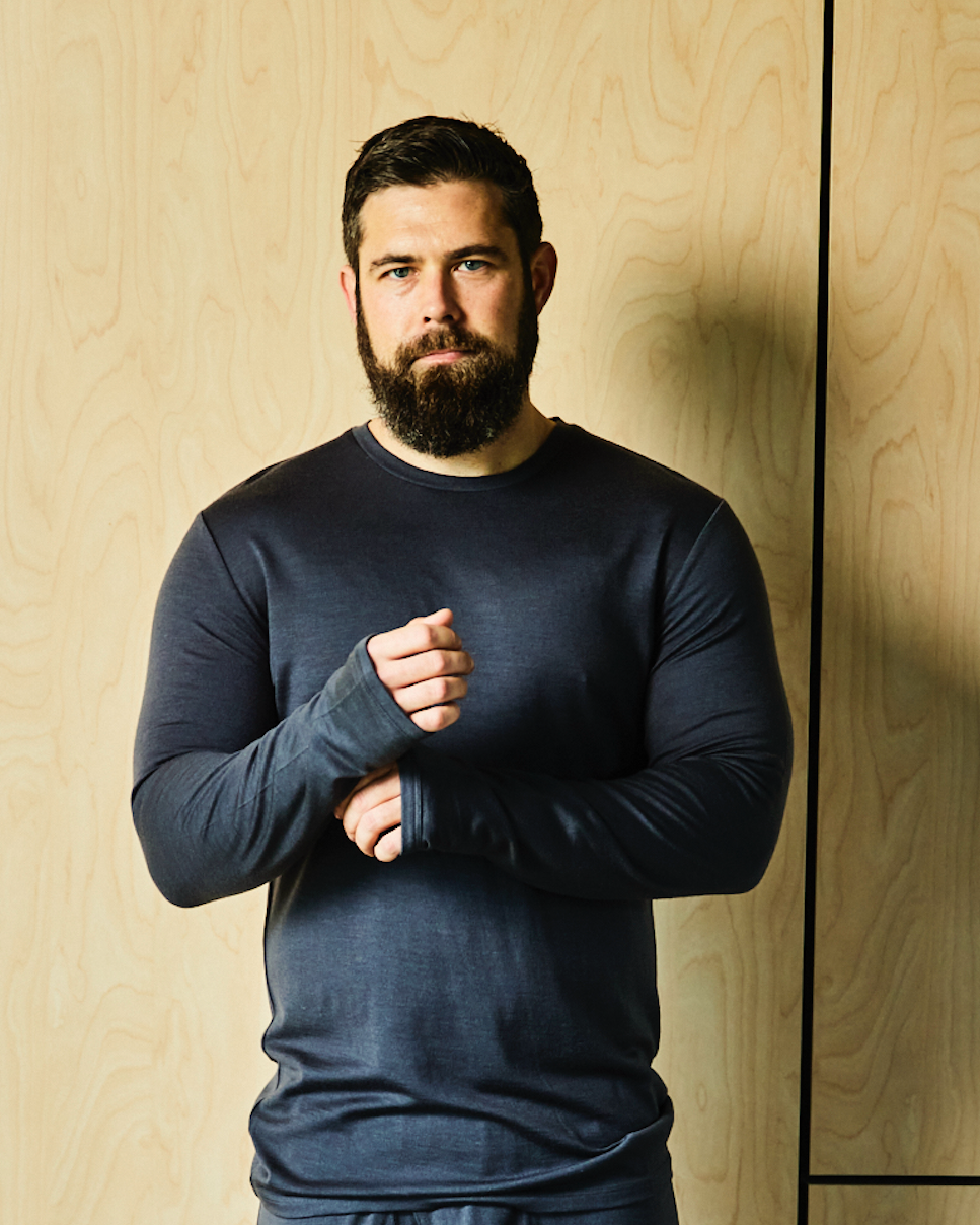 Fitted black merino long-sleeve top and thermal bottoms set — Merino 365 base layer combination worn together.